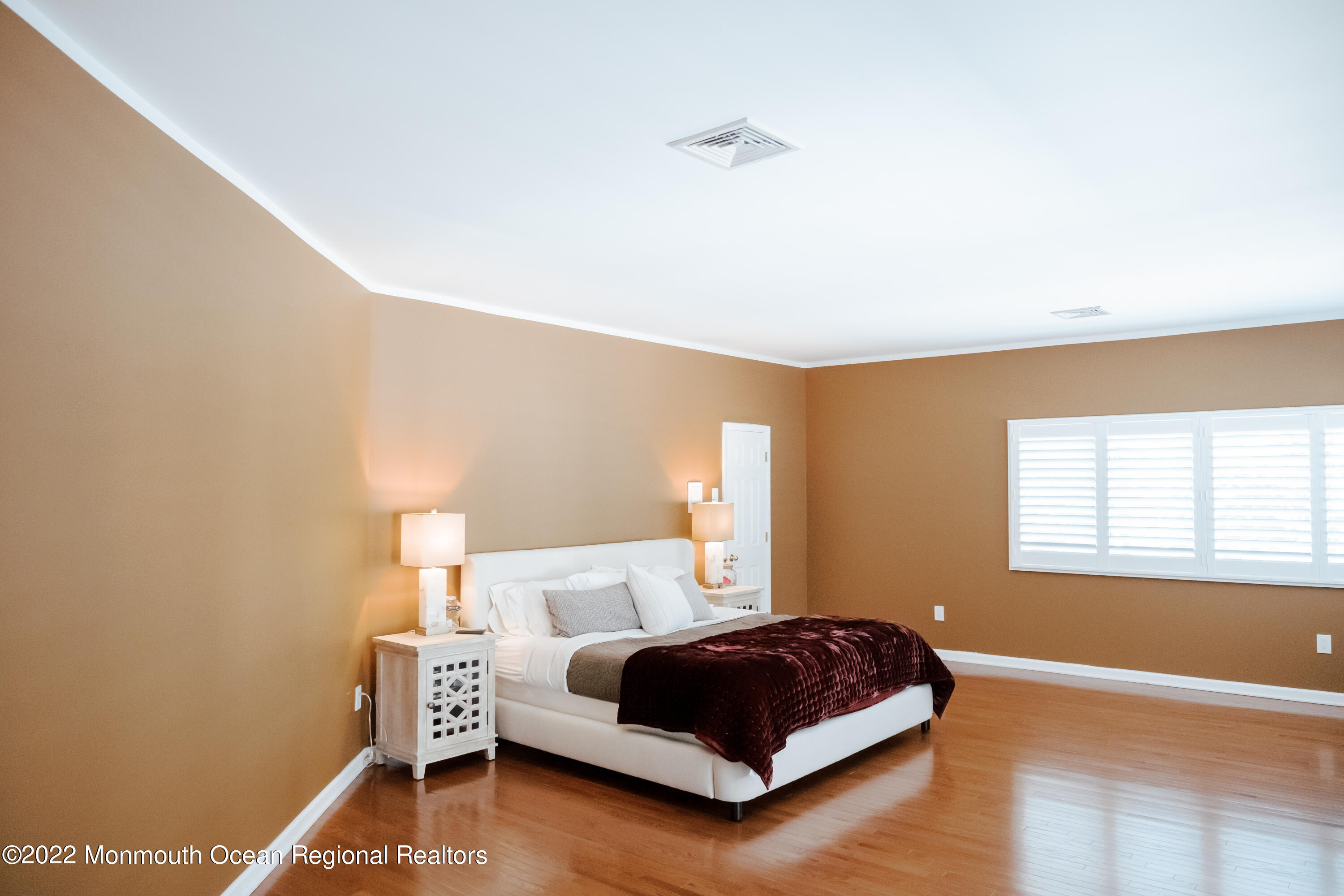 97 Mitchell Place Little Silver, NJ 07739 - Photo 5 of 21 a bedroom with a bed and a window