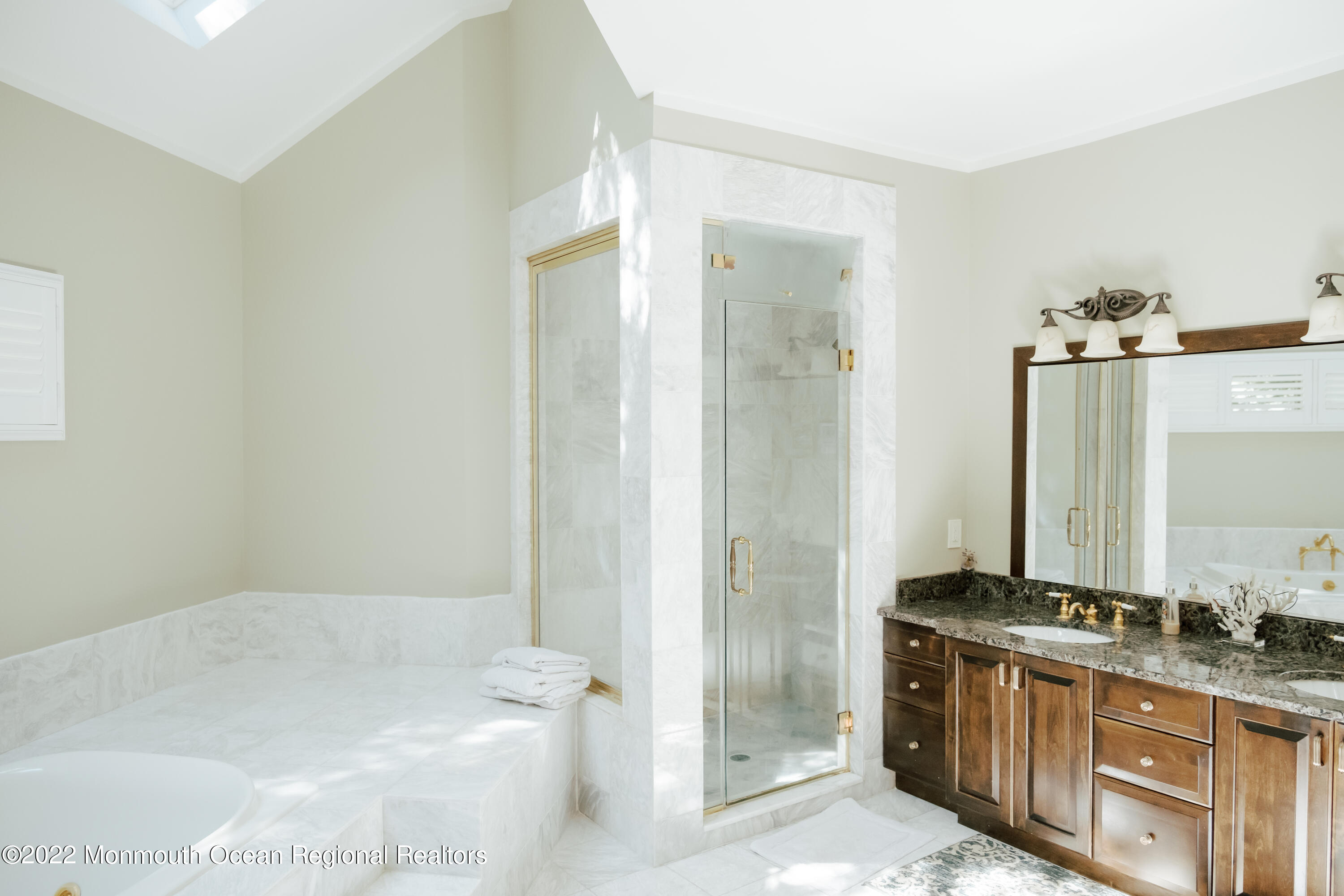 97 Mitchell Place Little Silver, NJ 07739 - Photo 7 of 21 a bathroom with a granite countertop sink and a mirror
