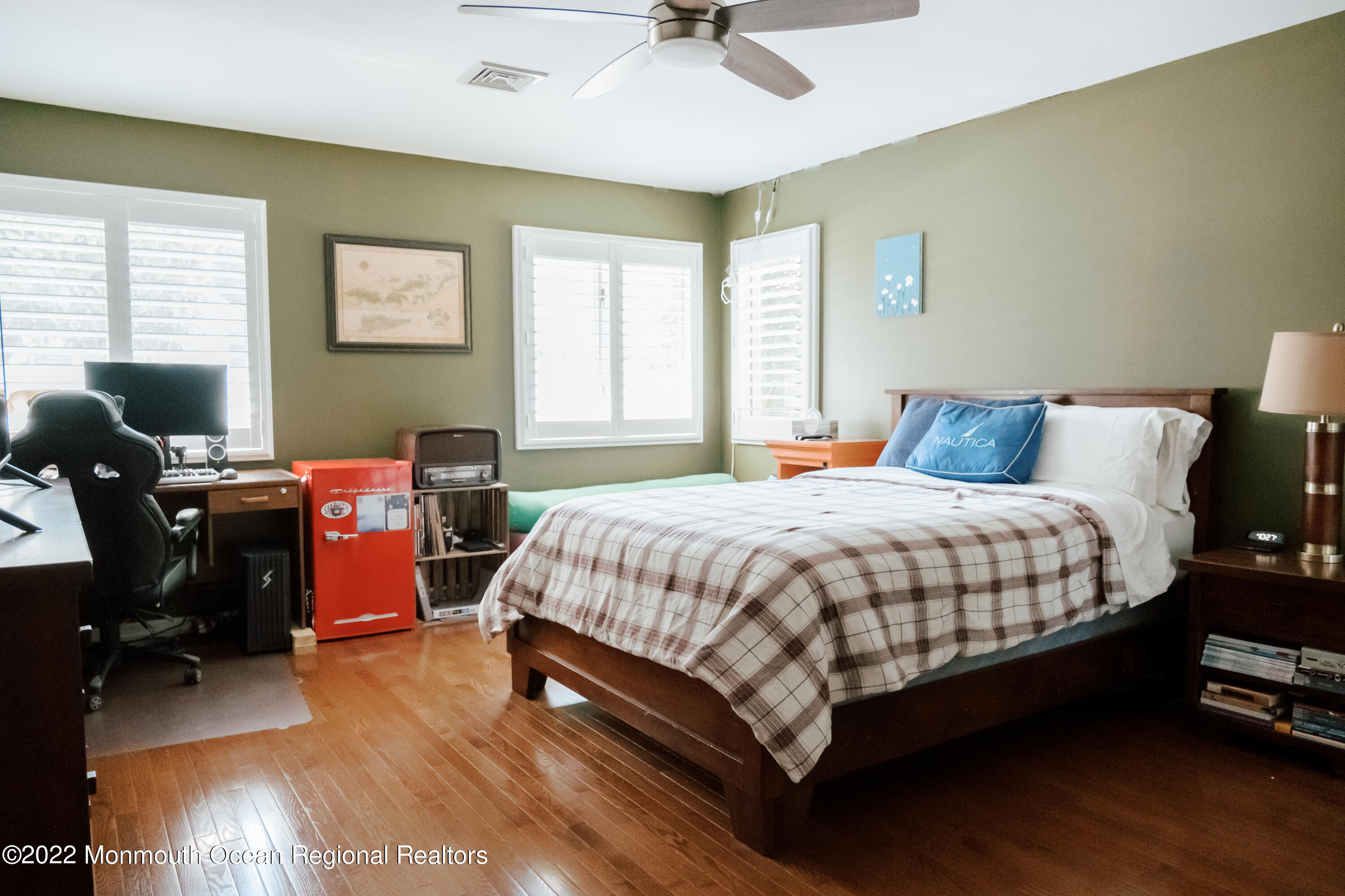 97 Mitchell Place Little Silver, NJ 07739 - Photo 10 of 21 a bedroom with a bed gym equipment and a window