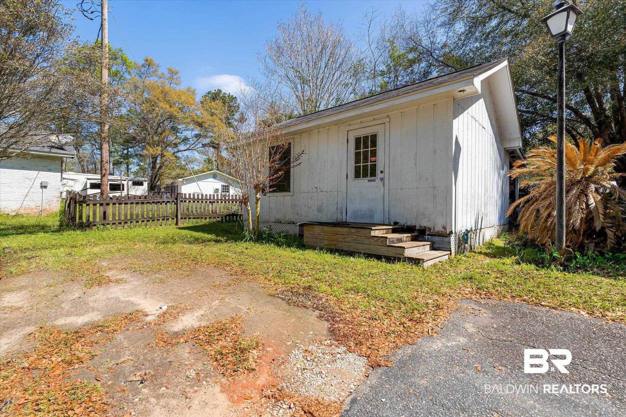 6030 Lott Road Eight Mile, AL 36613 - Photo 17 of 21 Exterior space with fence