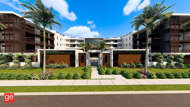 a view of building with yard