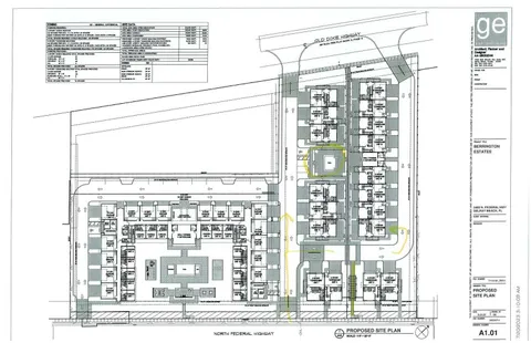 a black and white photo of a living room