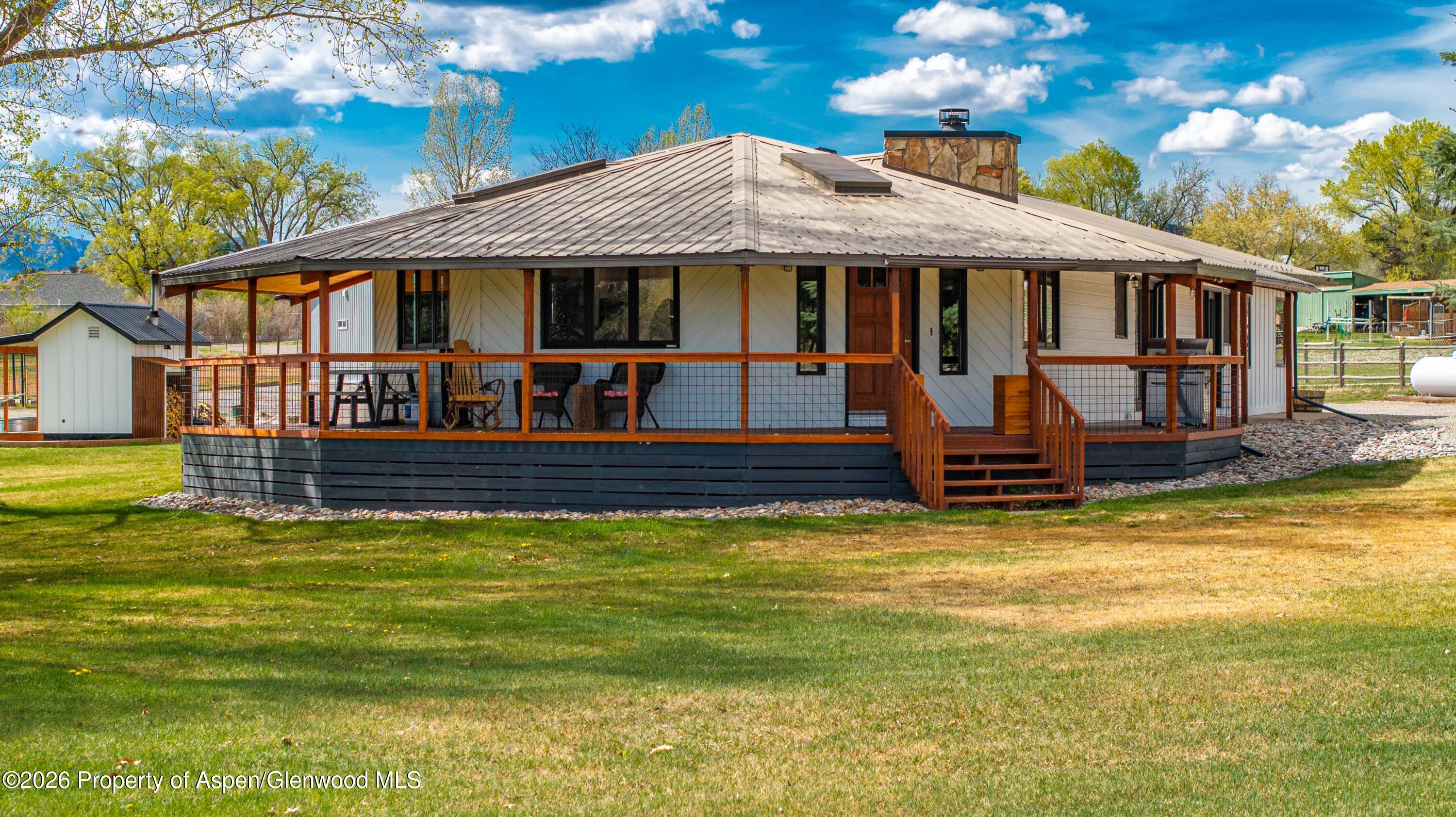 411 County Road 237 Silt, CO 81652 - Photo 2 of 45 a view of a house with swimming pool