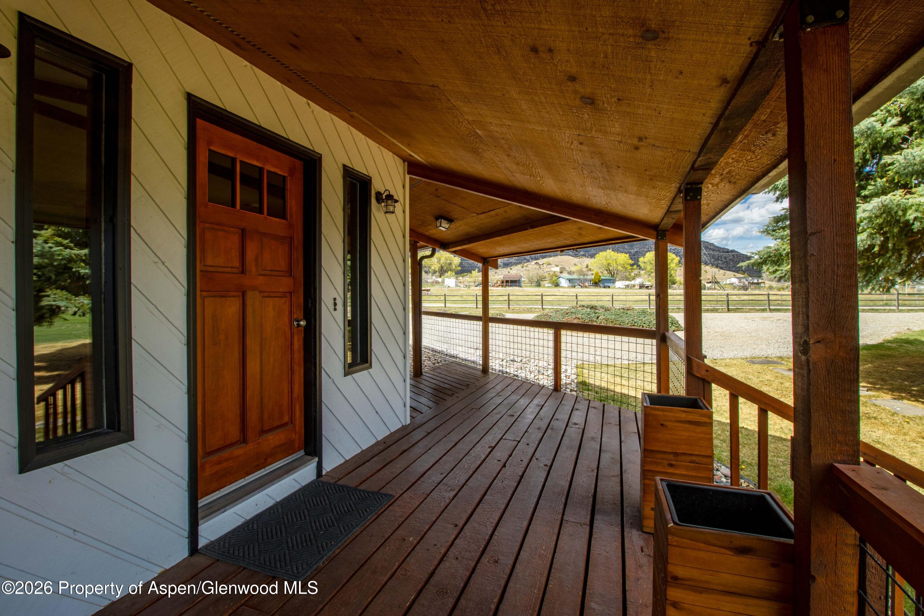 411 County Road 237 Silt, CO 81652 - Photo 21 of 45 a view of balcony with wooden floor