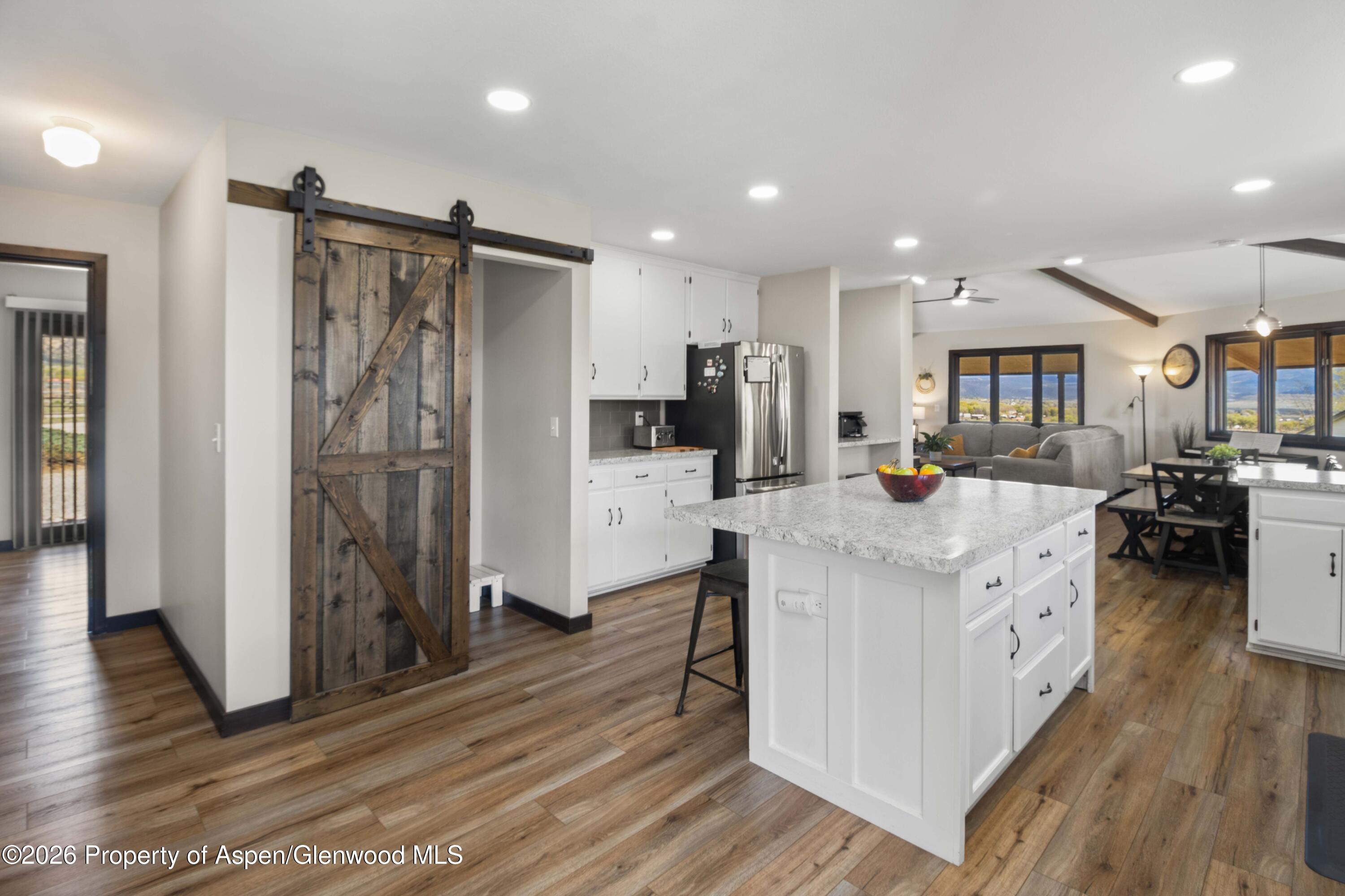 411 County Road 237 Silt, CO 81652 - Photo 28 of 45 a kitchen with stainless steel appliances a refrigerator and a stove
