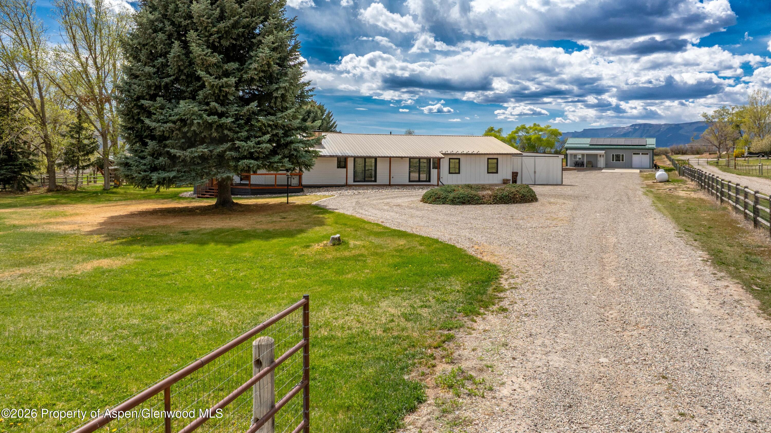 411 County Road 237 Silt, CO 81652 - Photo 3 of 45 a balcony with table and chairs