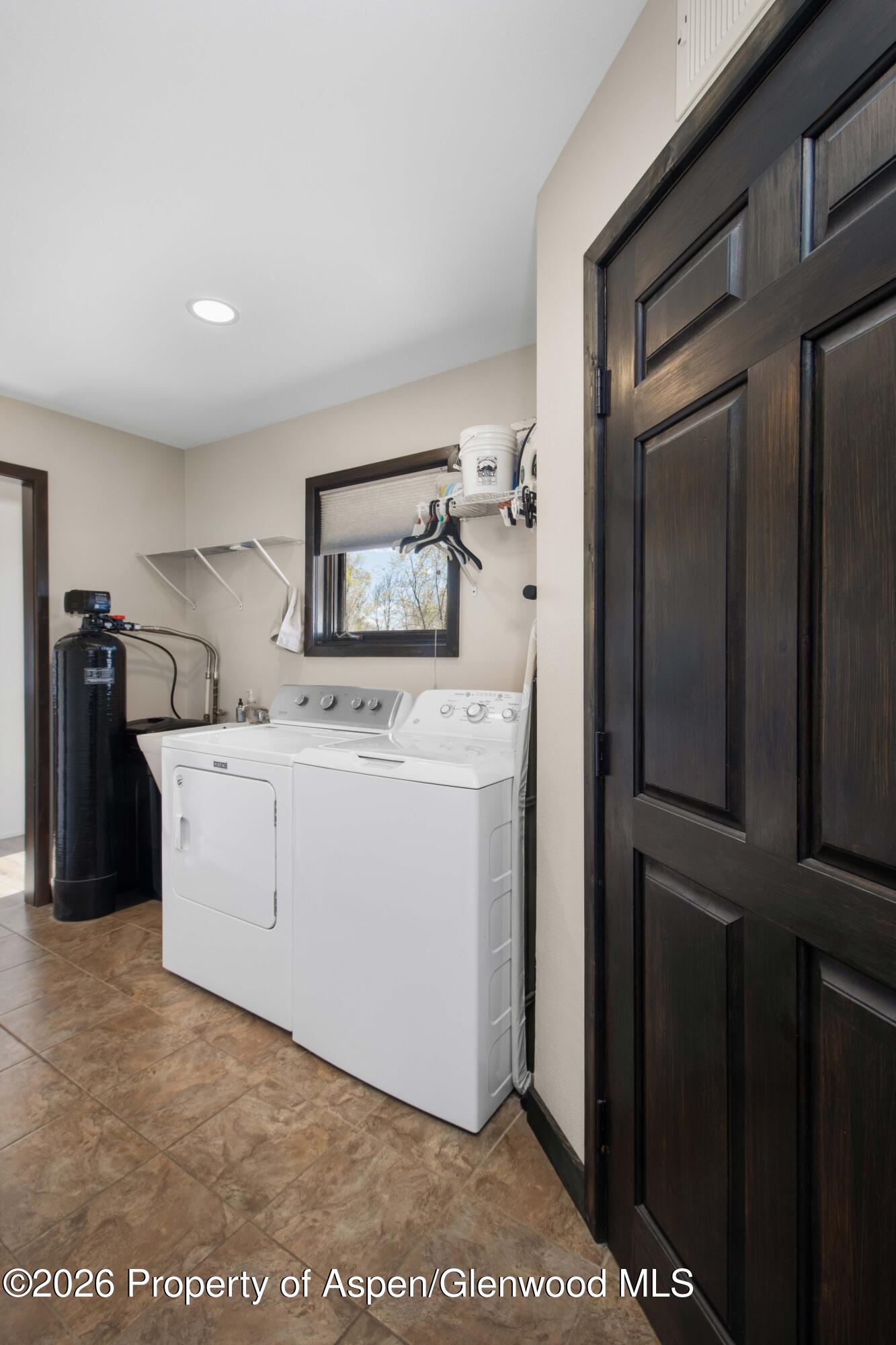 411 County Road 237 Silt, CO 81652 - Photo 33 of 45 a utility room with dryer and washer