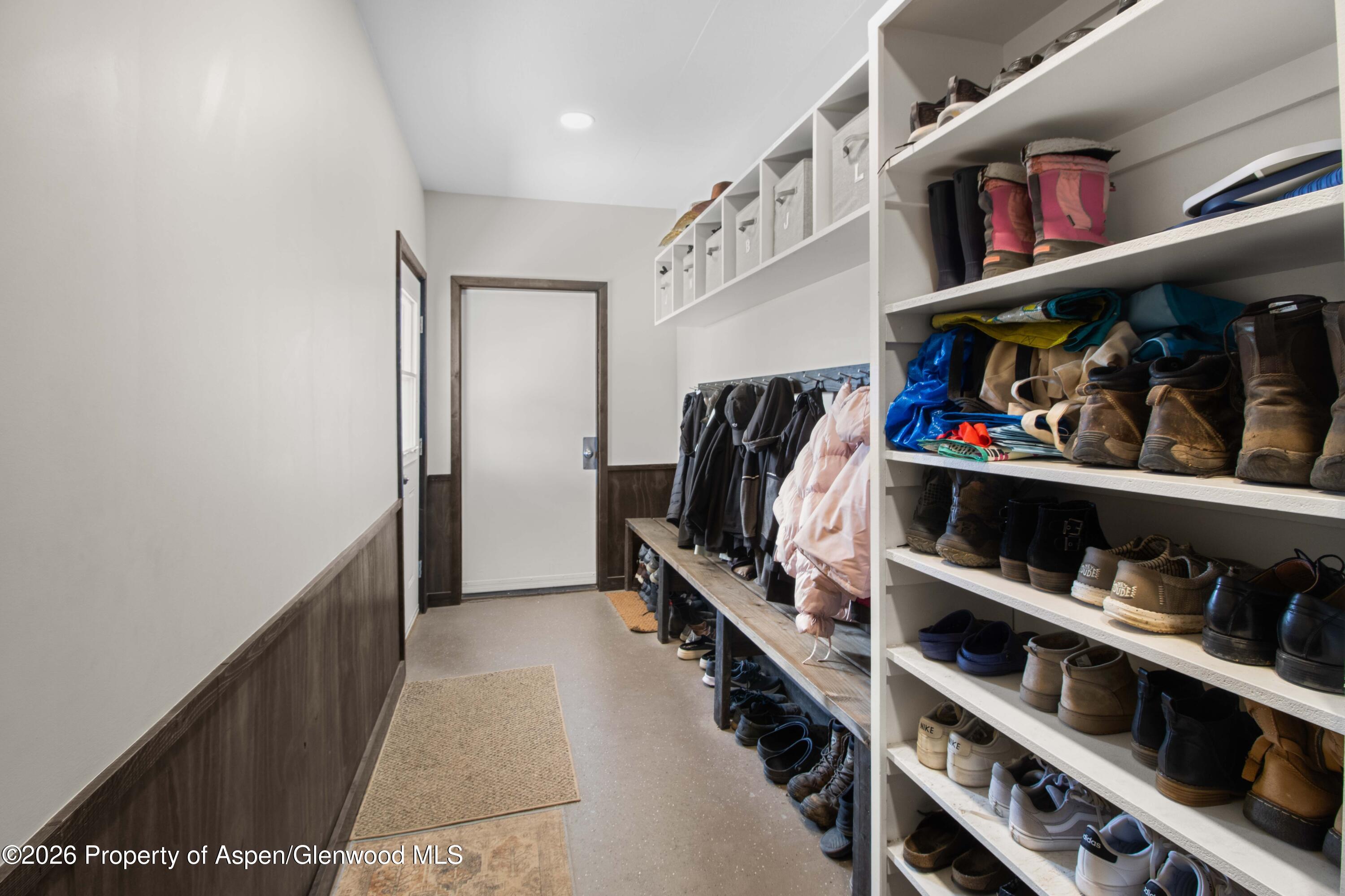 411 County Road 237 Silt, CO 81652 - Photo 37 of 45 a view of walk in closet with clothes and shoes