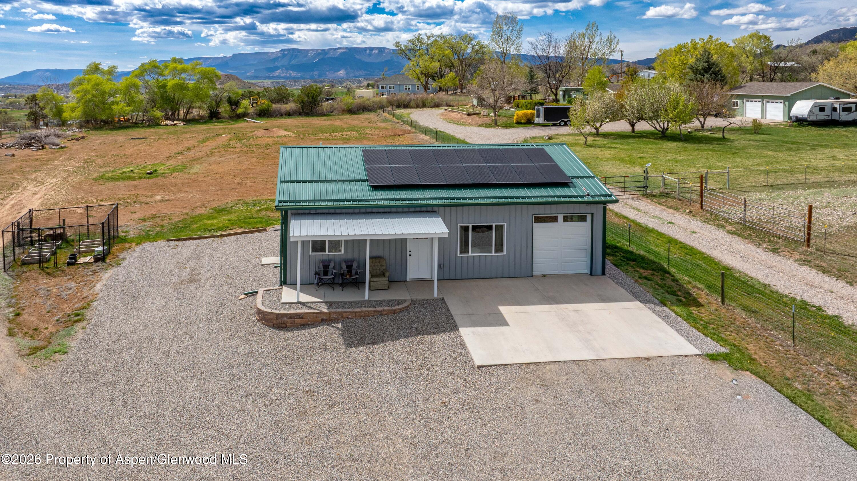 411 County Road 237 Silt, CO 81652 - Photo 8 of 45 a view of a house with a yard and lake view