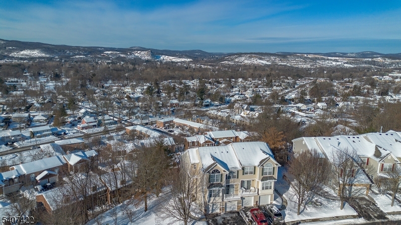 124 Ridge Drive Pompton Lakes, NJ 07442 - Photo 1 of 32 an aerial view of a house with a ocean view