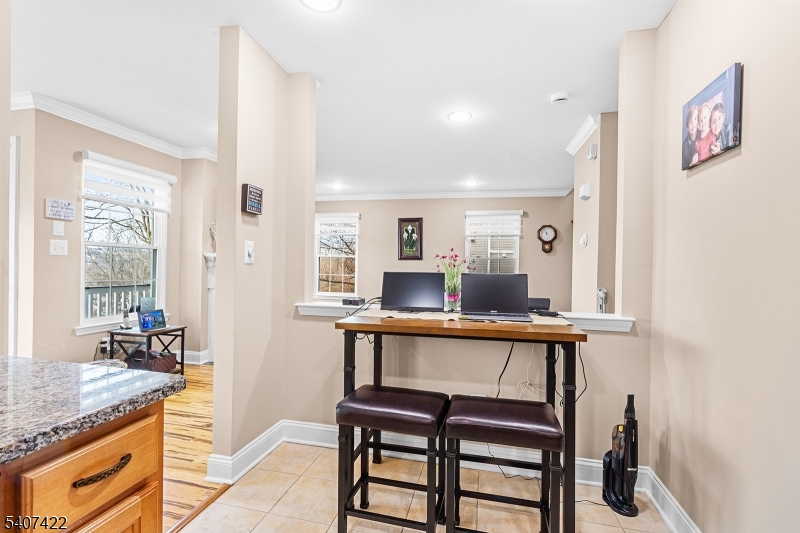 124 Ridge Drive Pompton Lakes, NJ 07442 - Photo 12 of 32 a view of a dining room with furniture and window