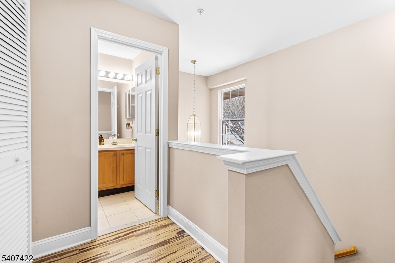 124 Ridge Drive Pompton Lakes, NJ 07442 - Photo 22 of 32 a bathroom with a sink and a mirror
