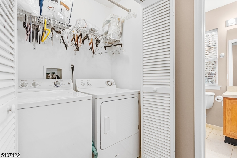 124 Ridge Drive Pompton Lakes, NJ 07442 - Photo 24 of 32 a utility room with dryer and washer