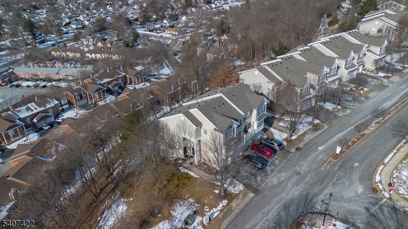 124 Ridge Drive Pompton Lakes, NJ 07442 - Photo 3 of 32 an aerial view of residential houses with outdoor space