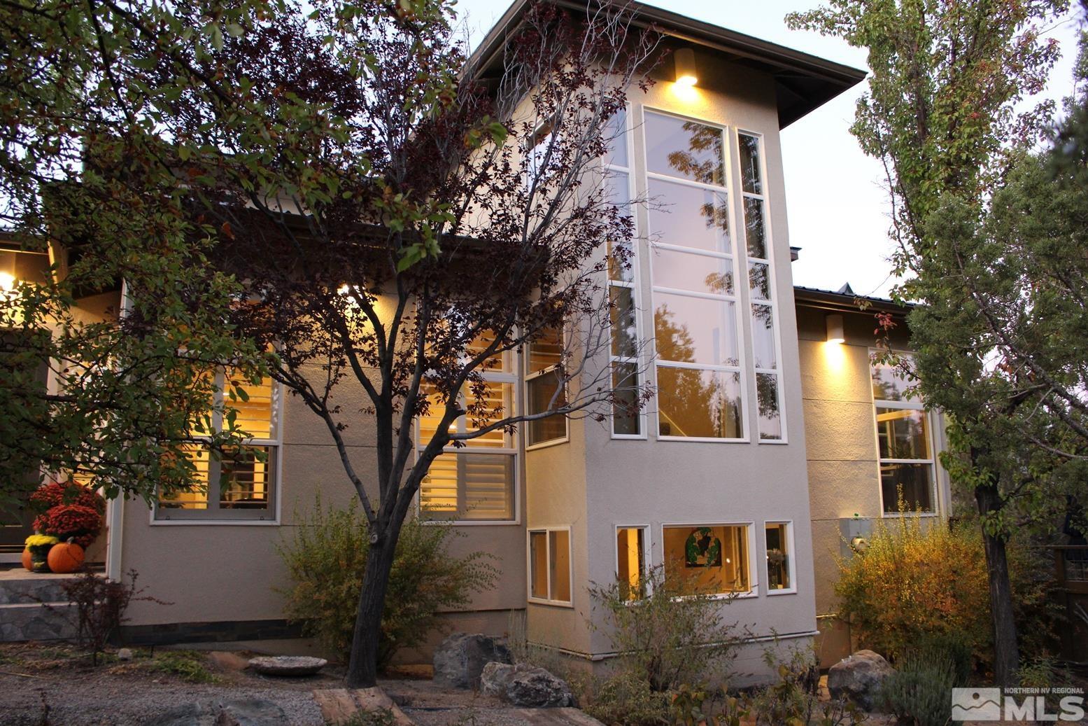 4115 Christy Way Reno, NV 89519 - Photo 3 of 40 a view of a building with a tree