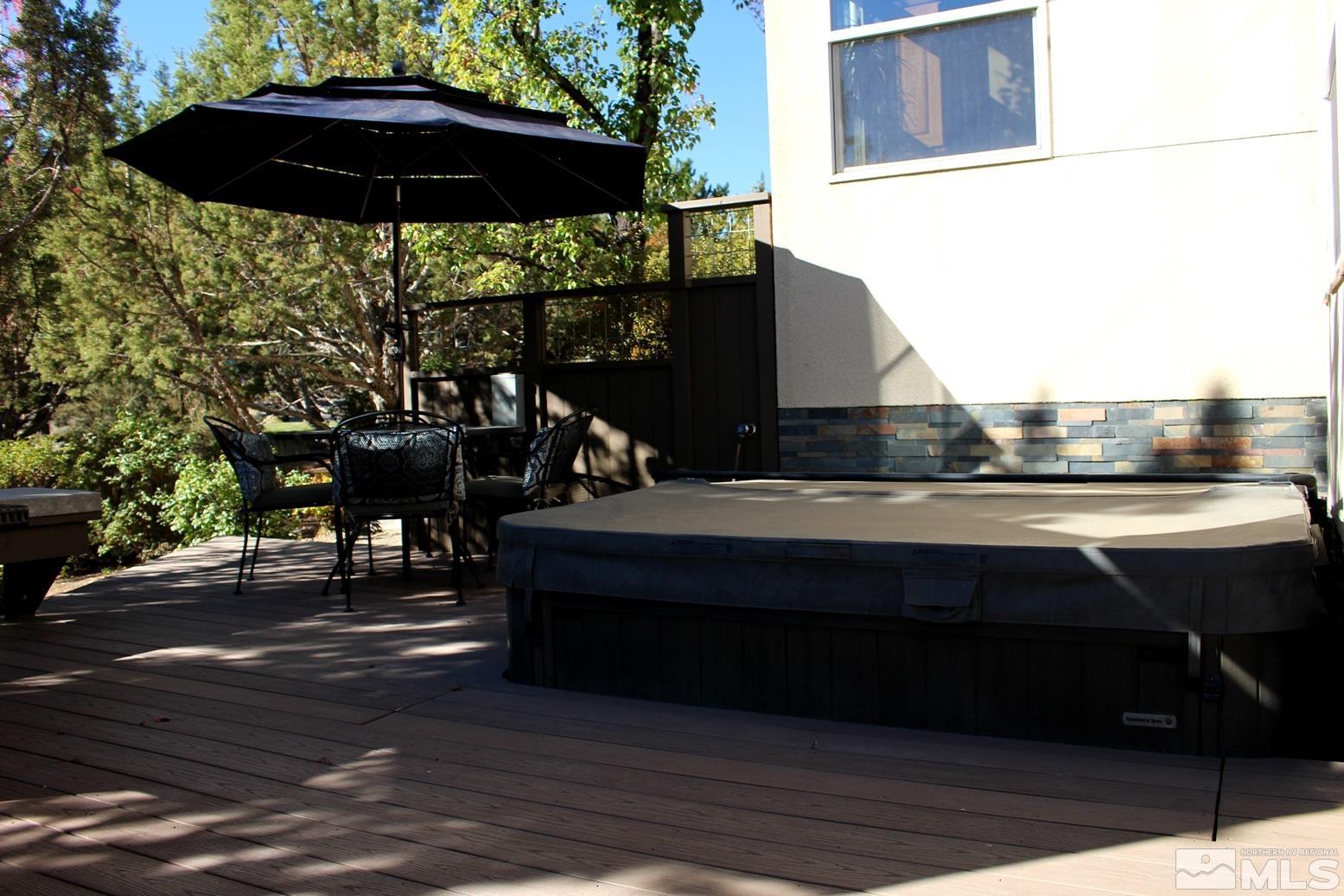 4115 Christy Way Reno, NV 89519 - Photo 36 of 40 a view of a two chairs and table in the patio