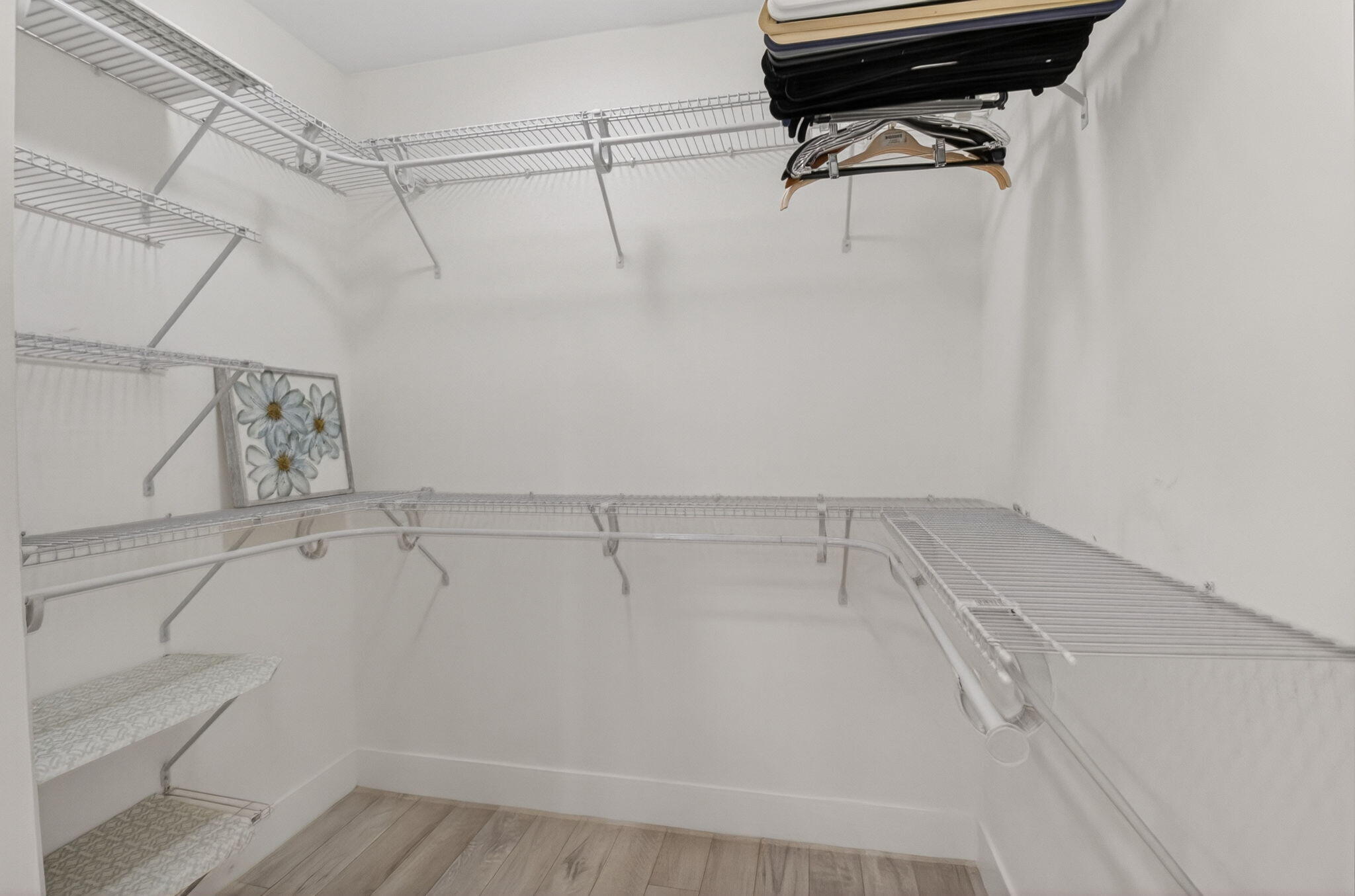 9299 Vista Del Lago, Unit 16D Boca Raton, FL 33428 - Photo 20 of 39 Primary Closet