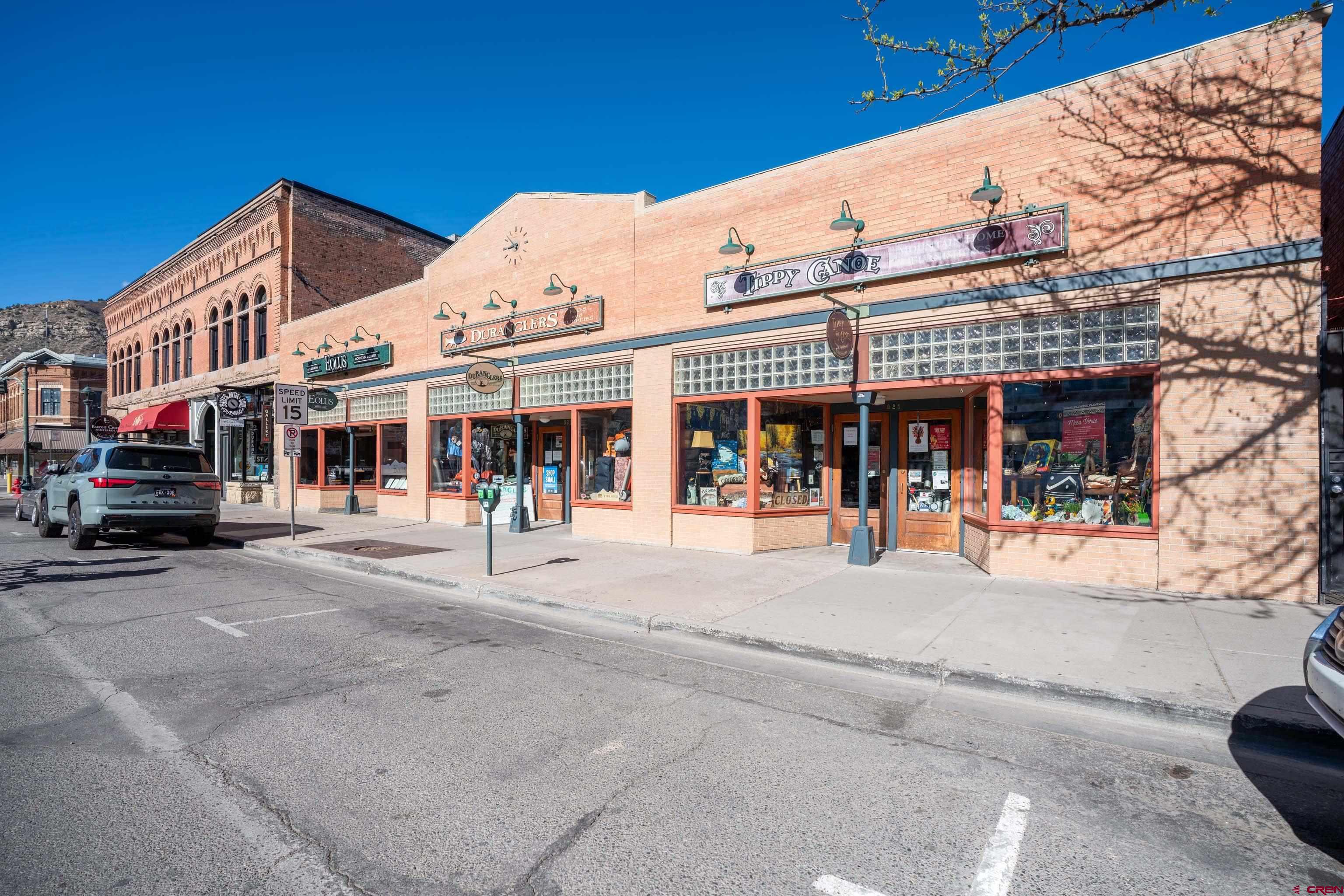a view of a food mall next to a road