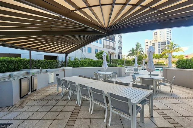 a view of an outdoor space with furniture