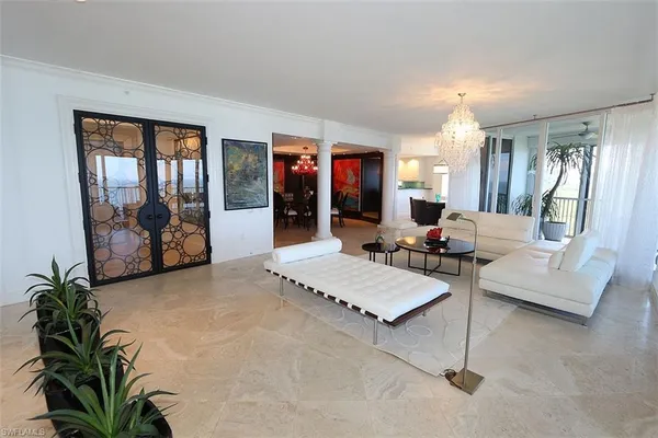 a living room with furniture and window