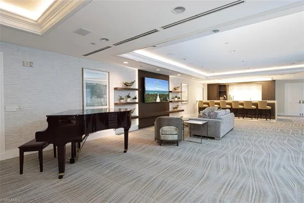 a view of a tall building with a tree in front