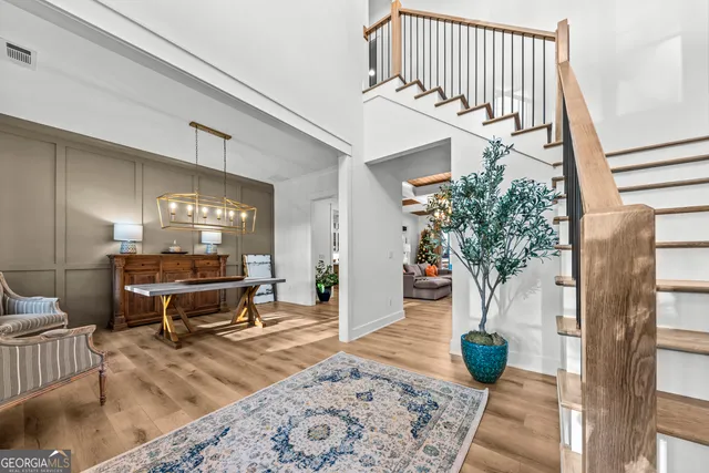 a view of staircase with a rug