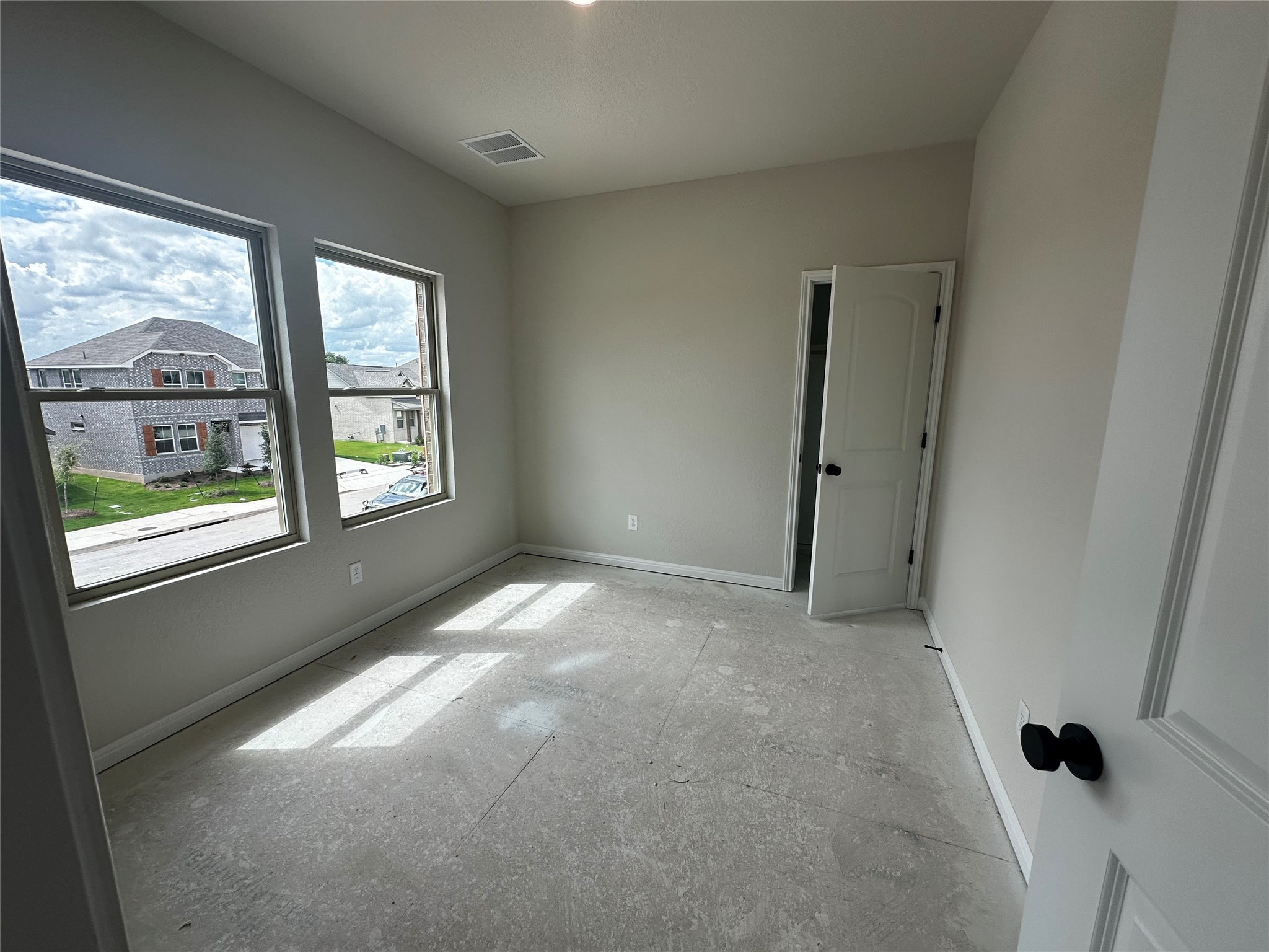 1053 Sienna Bear Road Georgetown, TX 78633 - Photo 20 of 32 an empty room with windows