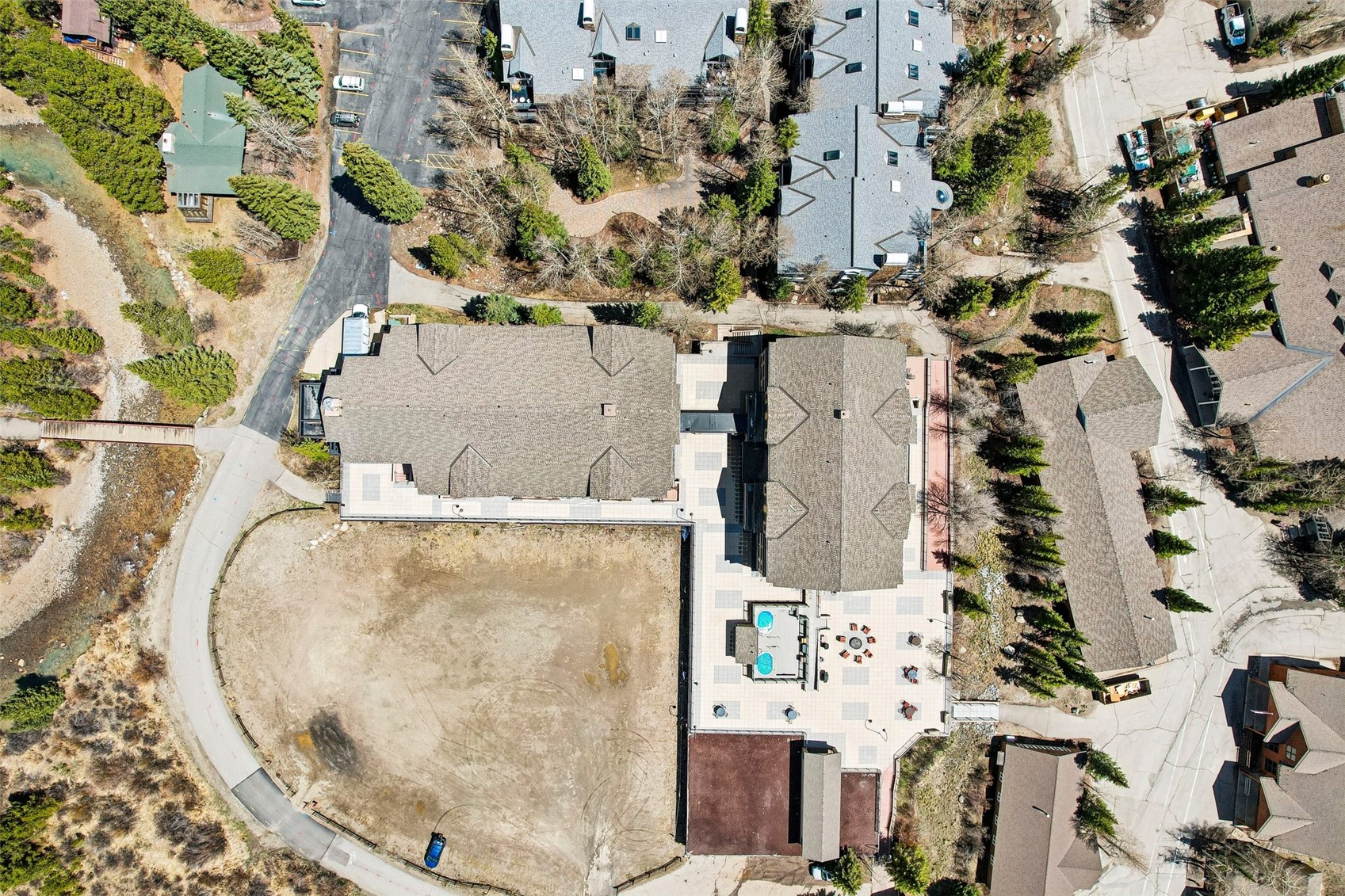 1211 West Keystone Road, Unit 2747 Keystone, CO 80435 - Photo 26 of 31 an aerial view of a multi story residential apartment building with yard