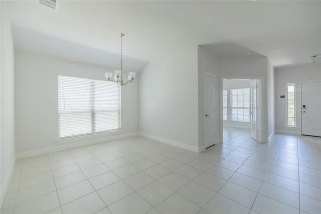 a view of a room and window