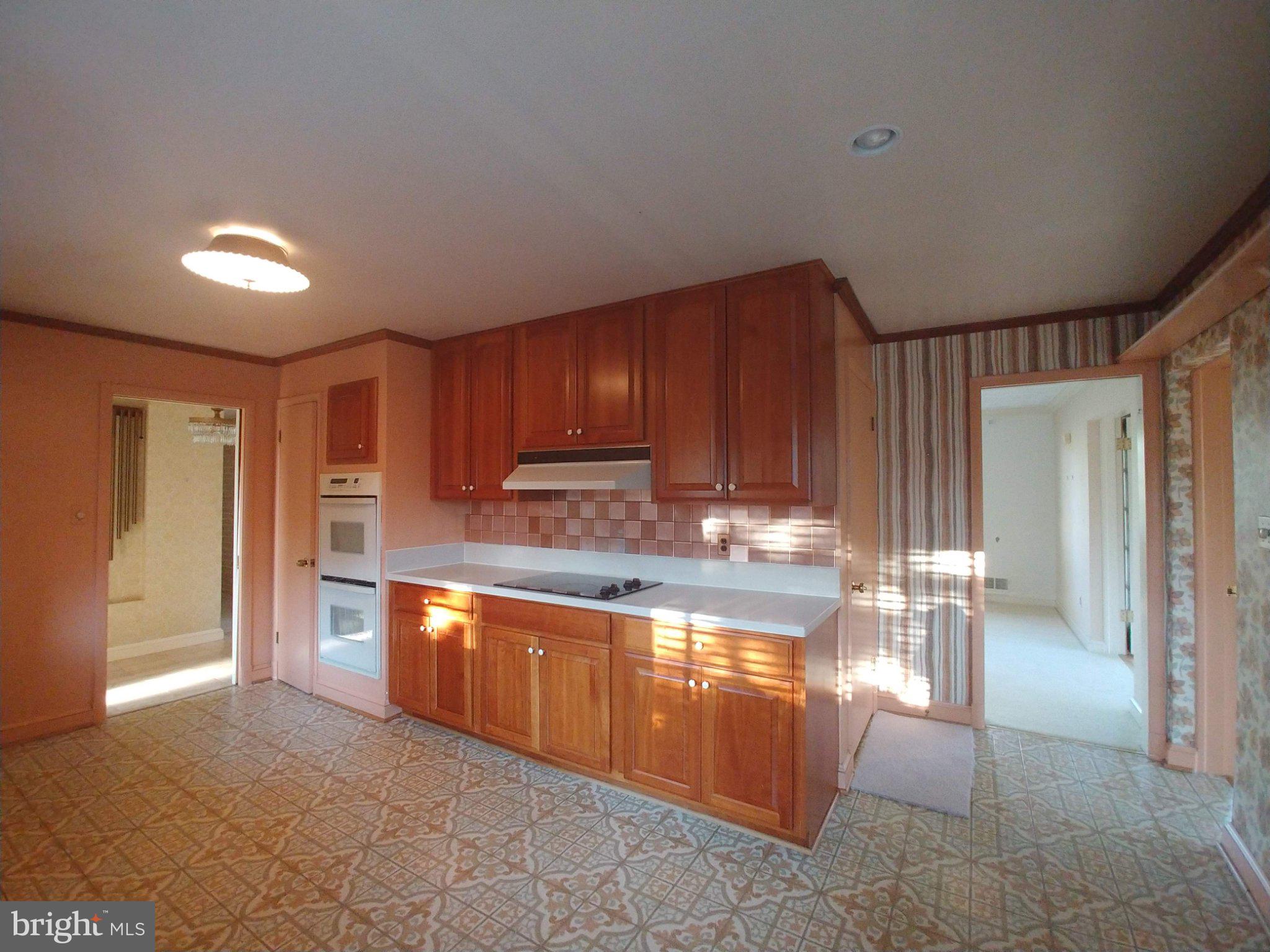 1429 Laburnum Street McLean, VA 22101 - Photo 11 of 26 Warm wood tones in a cozy kitchen.