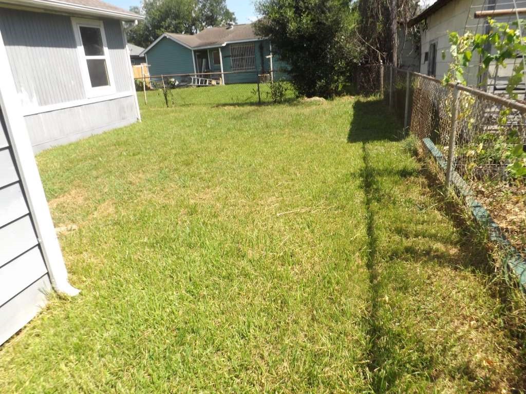 7619 Ilex Street Houston, TX 77012 - Photo 15 of 15 a view of a house with a yard
