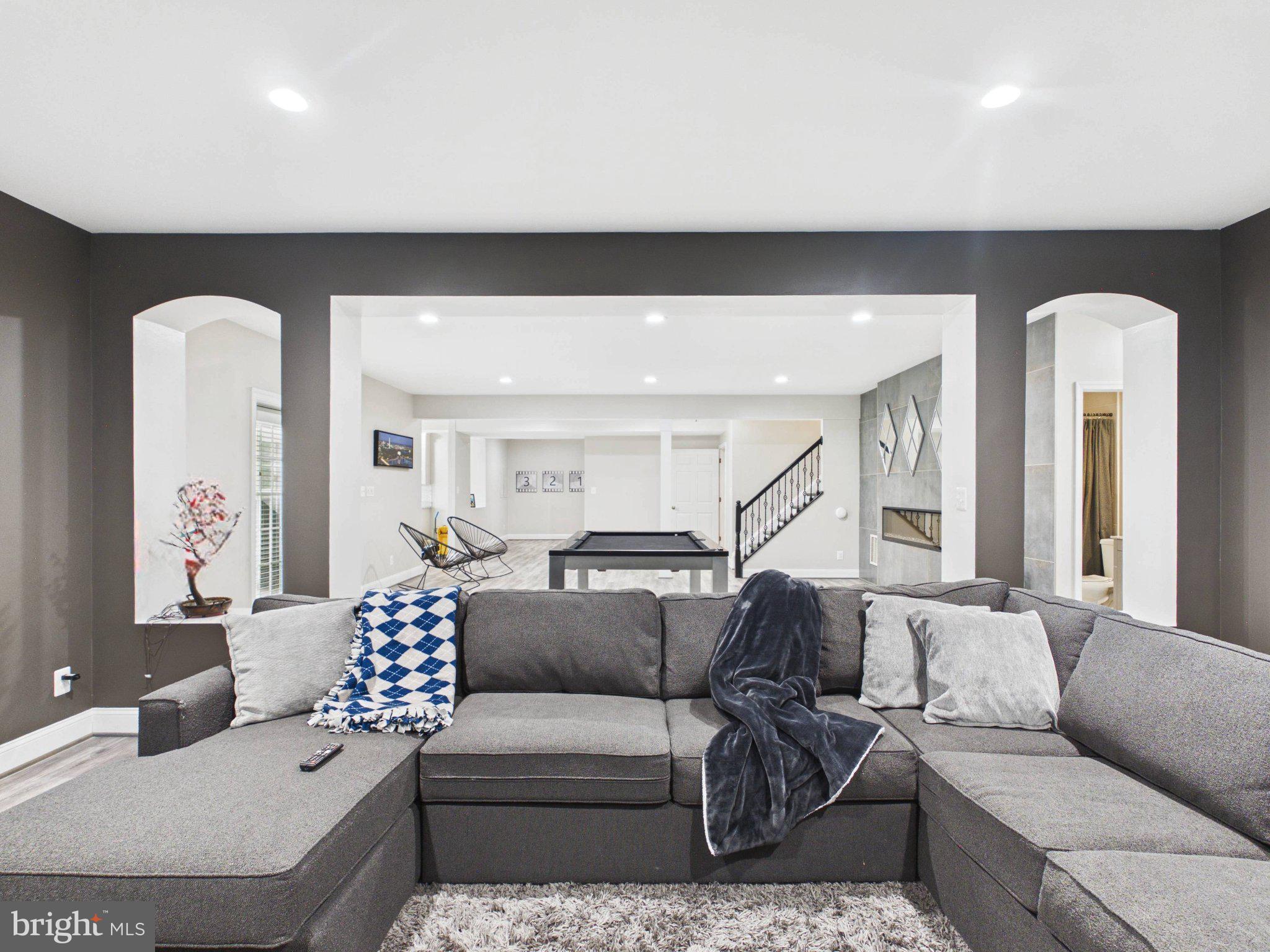 38565 Piggott Bottom Road Hamilton, VA 20158 - Photo 55 of 85 a living room with furniture and a wooden floor