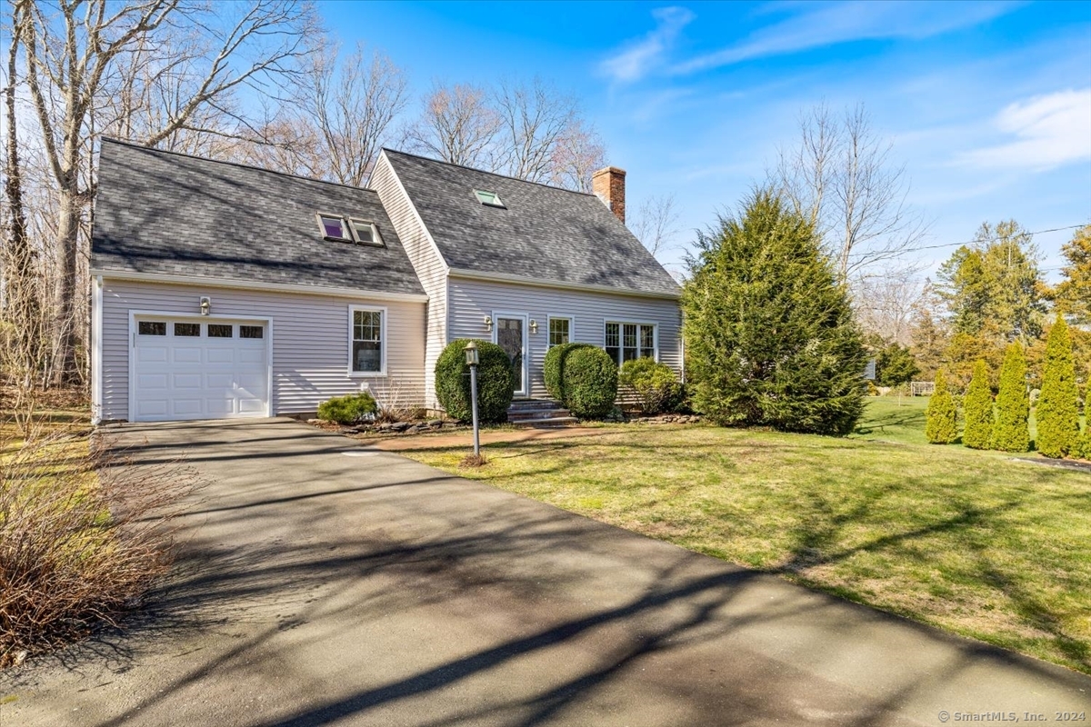 43 Bunker Hill Road Guilford, CT 06437 - Photo 1 of 1 a front view of a house with a yard