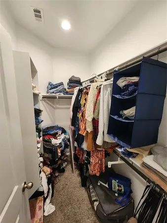 a kitchen with granite countertop a stove and a microwave