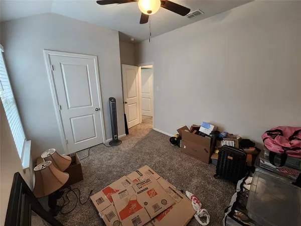 a living room with hard wood floor
