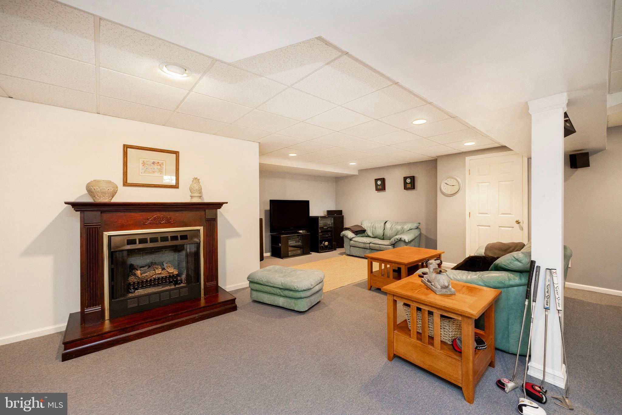 5 Brampton Road Malvern, PA 19355 - Photo 38 of 59 Lower Level Gas Fireplace Heats Entire Level