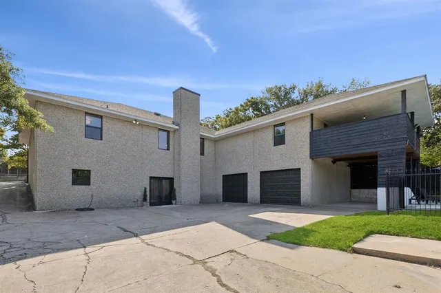a view of a swimming pool with a yard
