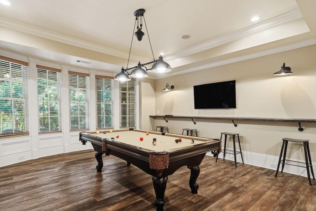 841 Camden Park Court Atlanta, GA 30342 - Photo 106 of 120 a living room with a flat screen tv and a large window