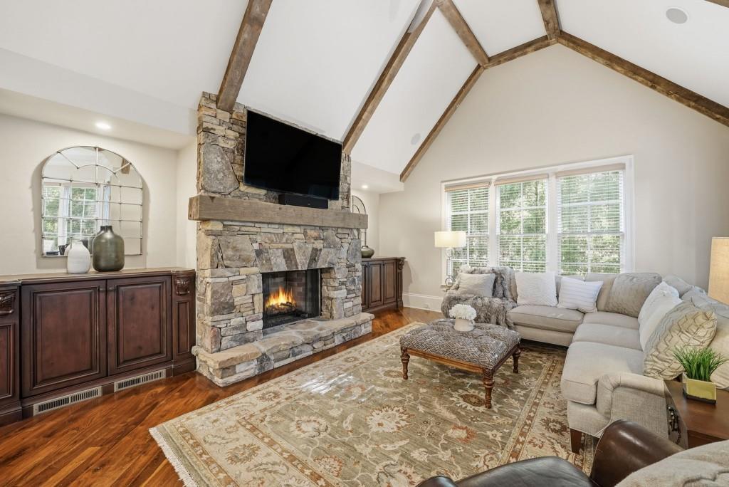841 Camden Park Court Atlanta, GA 30342 - Photo 28 of 120 a living room with furniture fireplace and flat screen tv