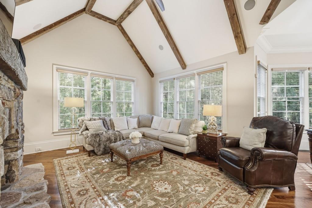 841 Camden Park Court Atlanta, GA 30342 - Photo 30 of 120 a living room with furniture and a large window