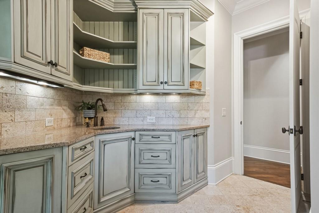 841 Camden Park Court Atlanta, GA 30342 - Photo 46 of 120 a kitchen with stainless steel appliances granite countertop a sink and cabinets
