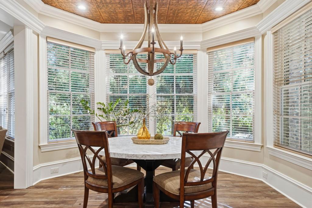 841 Camden Park Court Atlanta, GA 30342 - Photo 86 of 120 a view of a dining room with furniture window and wooden floor