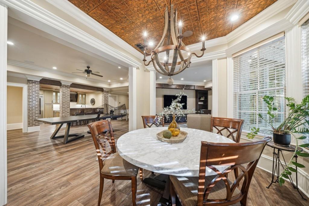 841 Camden Park Court Atlanta, GA 30342 - Photo 87 of 120 a view of a dining room with furniture window and wooden floor