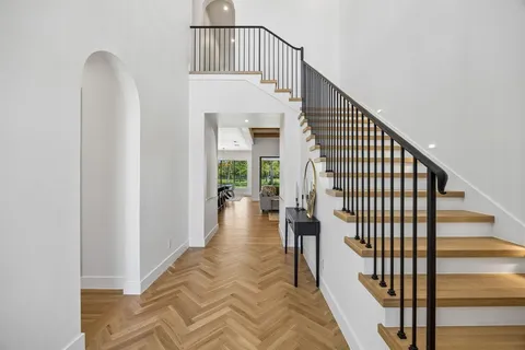 a view of entryway with wooden floor
