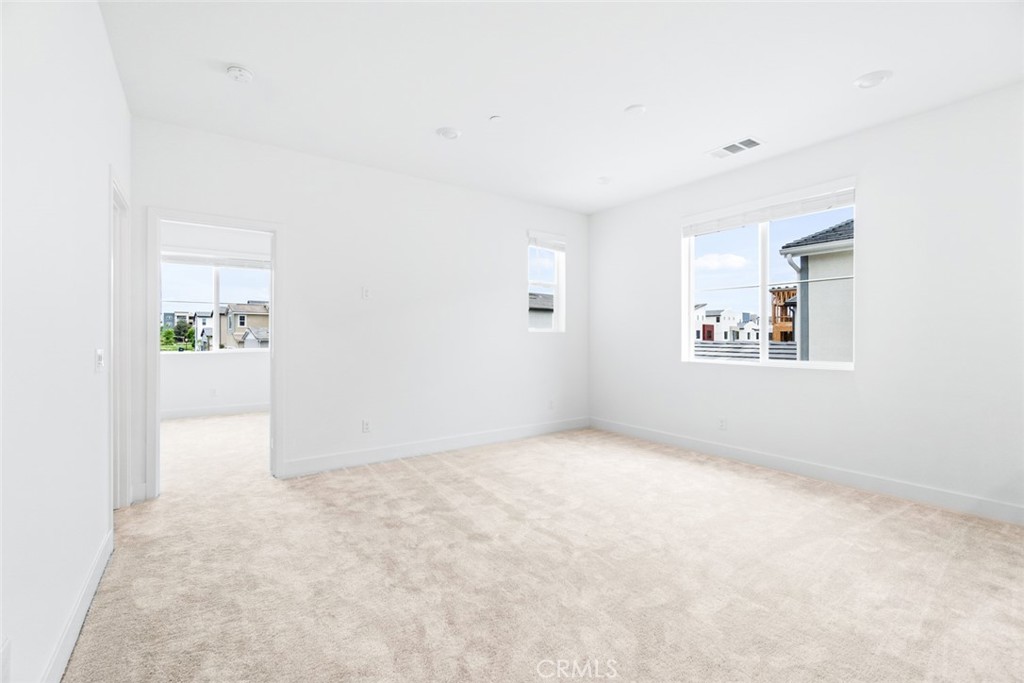 374 Baluster Irvine, CA 92618 - Photo 18 of 64 an empty room with windows