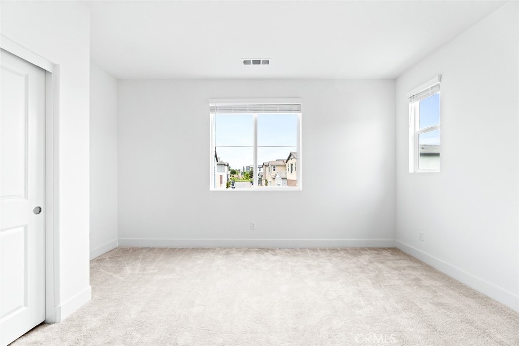374 Baluster Irvine, CA 92618 - Photo 21 of 64 an empty room with a window