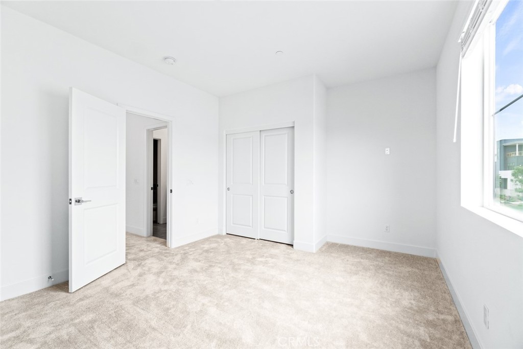 374 Baluster Irvine, CA 92618 - Photo 22 of 64 a view of an empty room with a window