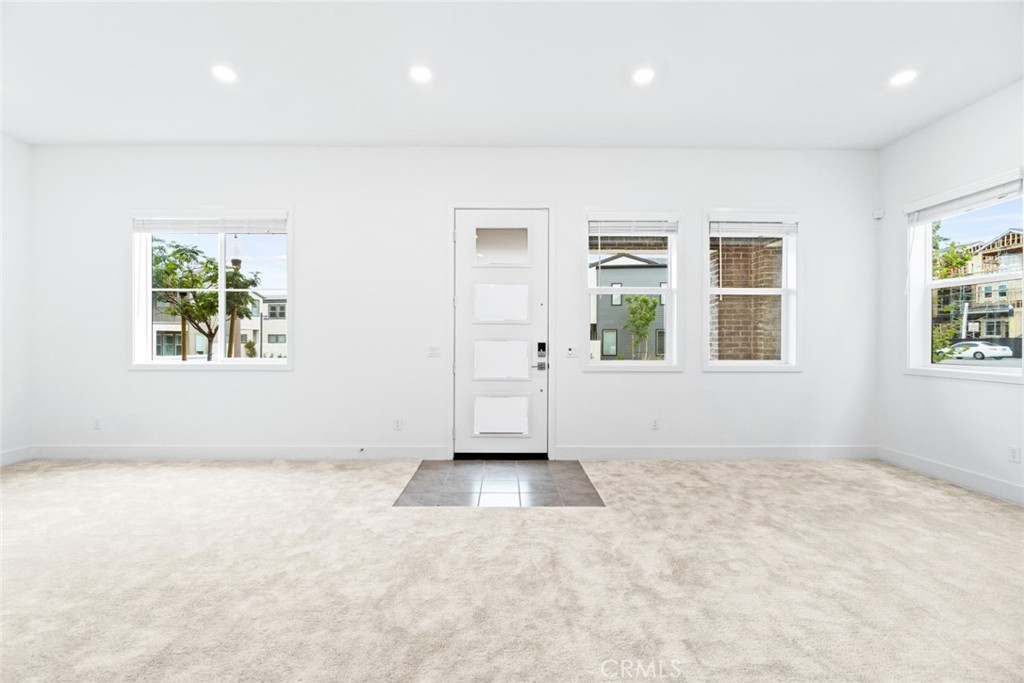 374 Baluster Irvine, CA 92618 - Photo 3 of 64 an empty room with windows