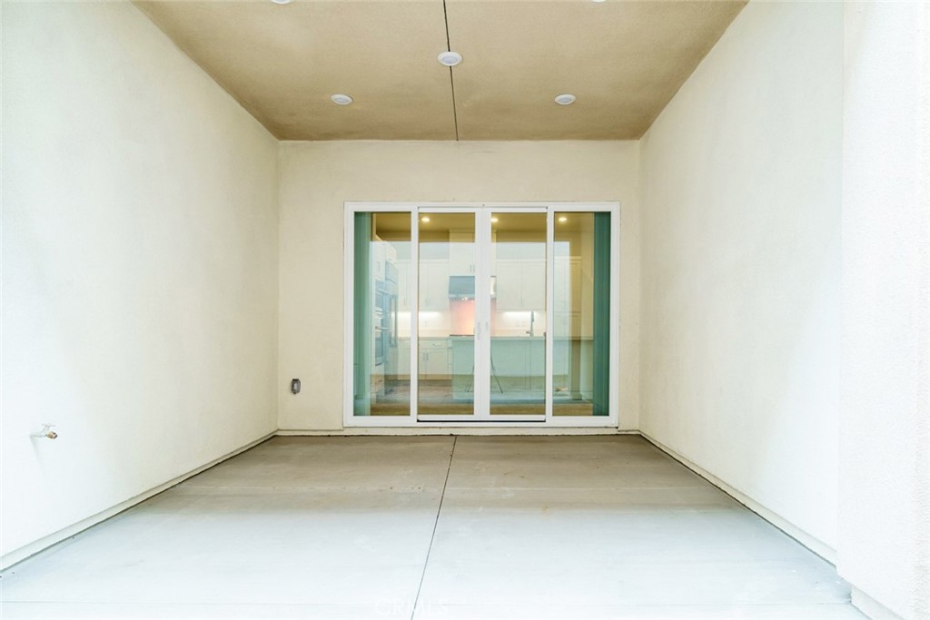 374 Baluster Irvine, CA 92618 - Photo 36 of 64 a view of an empty room with a window