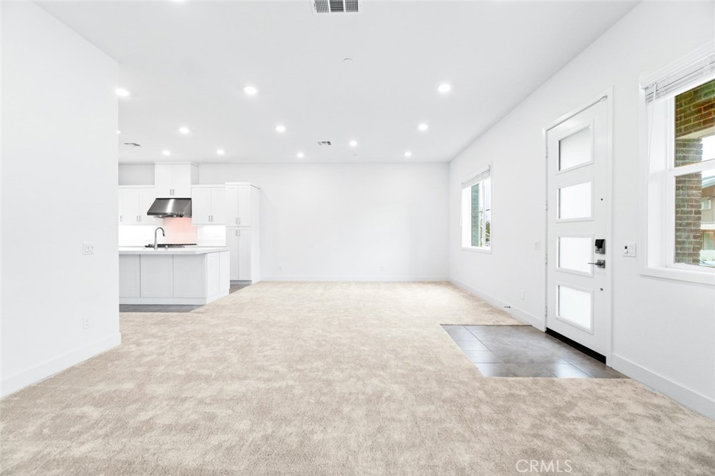 374 Baluster Irvine, CA 92618 - Photo 4 of 64 a view of a kitchen with refrigerator and windows